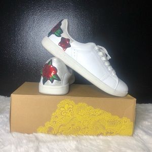 All white sneakers with sequenced roses 🌹